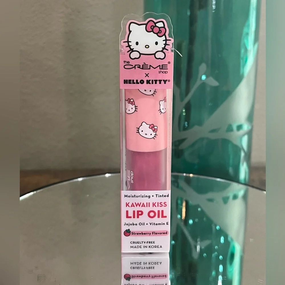 The Crème x Hello Kitty Kawaii Kiss Lip Oil, strawberry flavored, new!